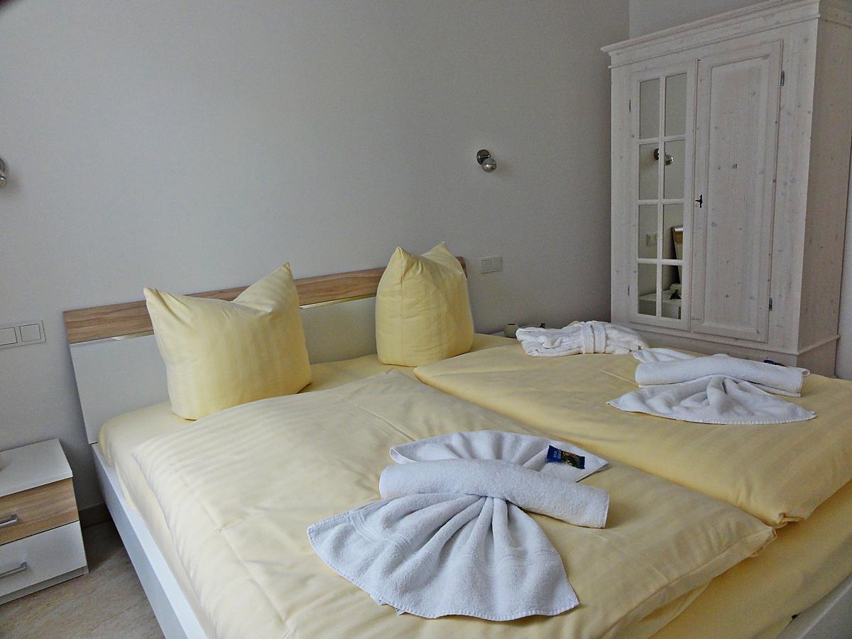 3 Zimmer Ferienwohnung Haus Meeresblick Mit Meerblick A005 Mit Suedterrasse Und Strandkorb 바베 외부 사진